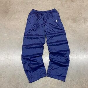 Navy blue Adidas track pants with drawstring waist and‎ embroidered logo adidas
